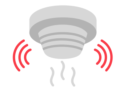 Smoke and carbon monoxide detector mounted on a ceiling being tested